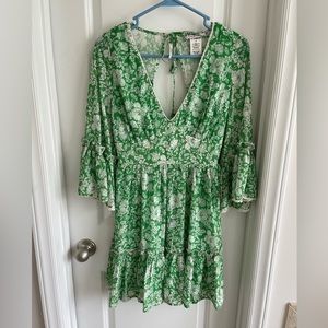 Green and white floral print dress with bell sleeves